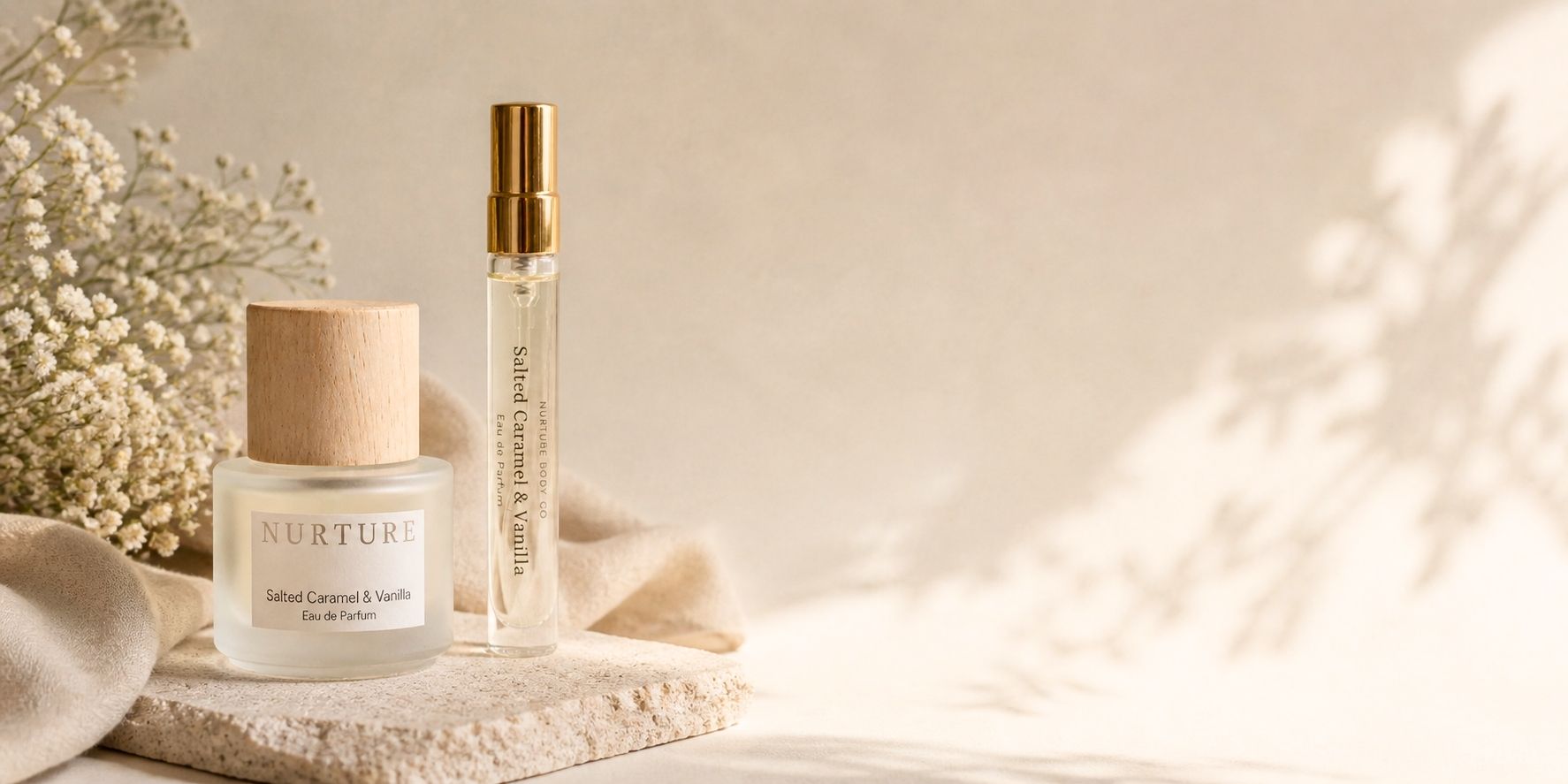 Salted Caramel & Vanilla perfume on a stone background