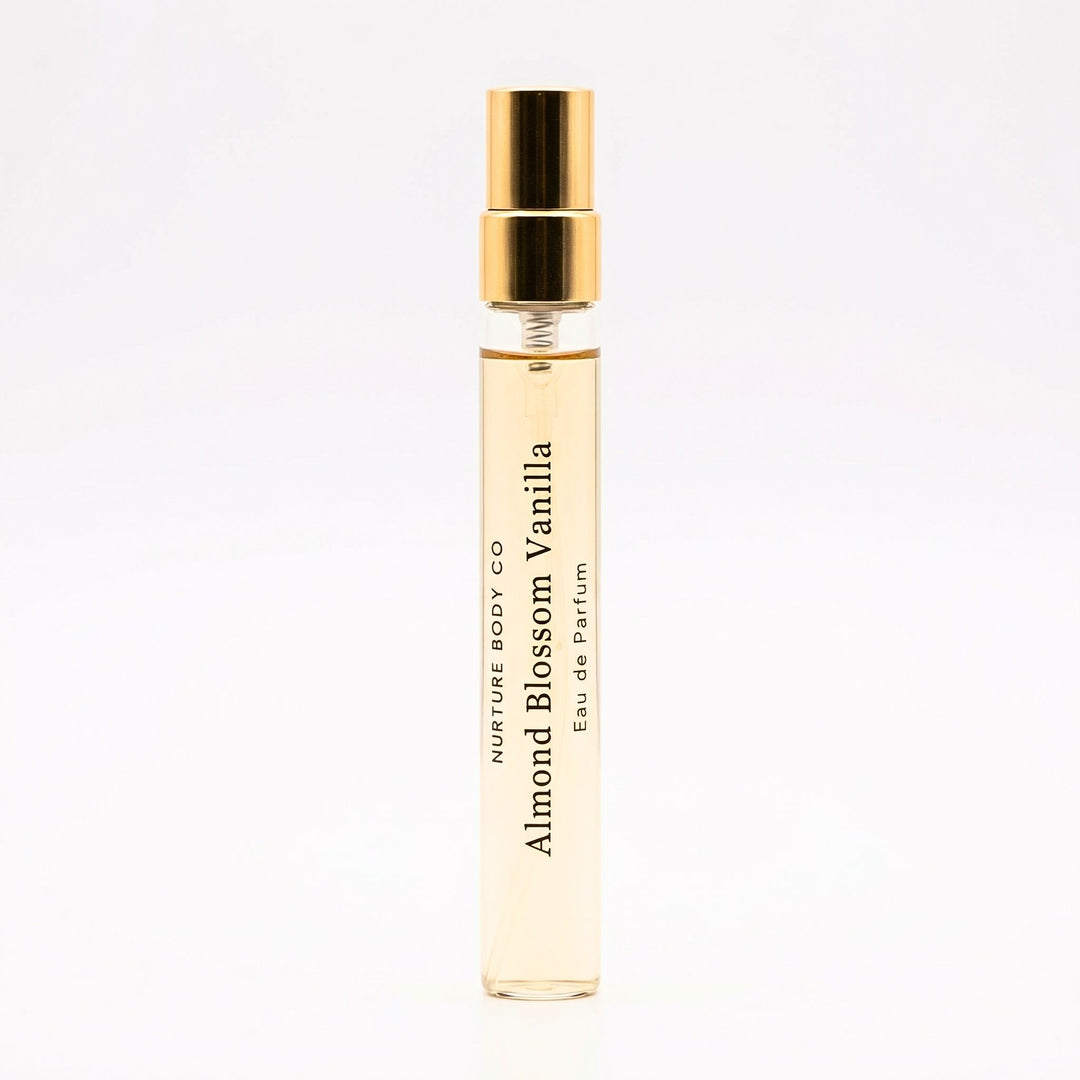 Perfume bottle labeled 'Almond Blossom Vanilla' on a white background