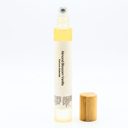 Almond Blossom perfume rollerball on a white background