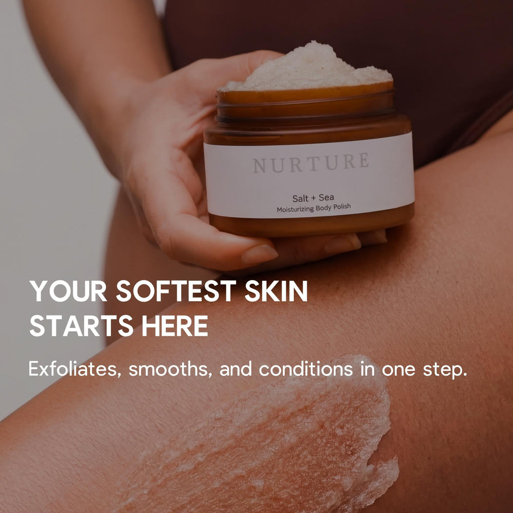 Woman holding an open jar of Body Polish on her thigh.