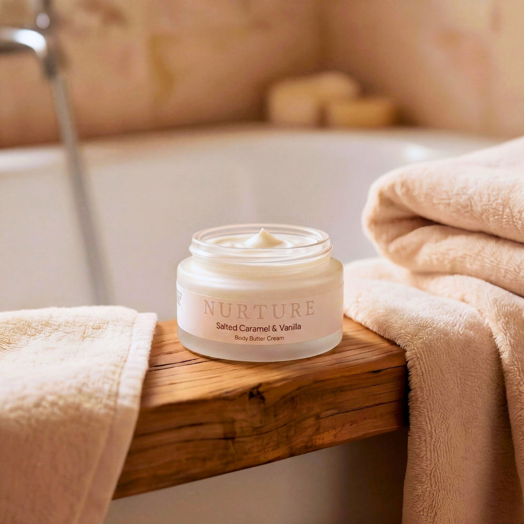 Jar of body butter on a wooden ledge.
