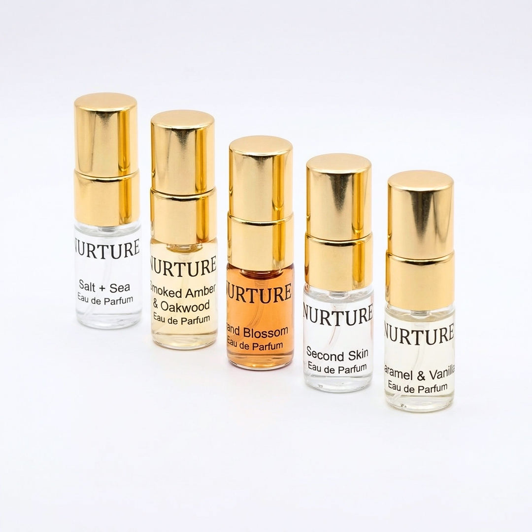 A row of sample perfumes from the Clean Perfume Discovery kit, on a white background.