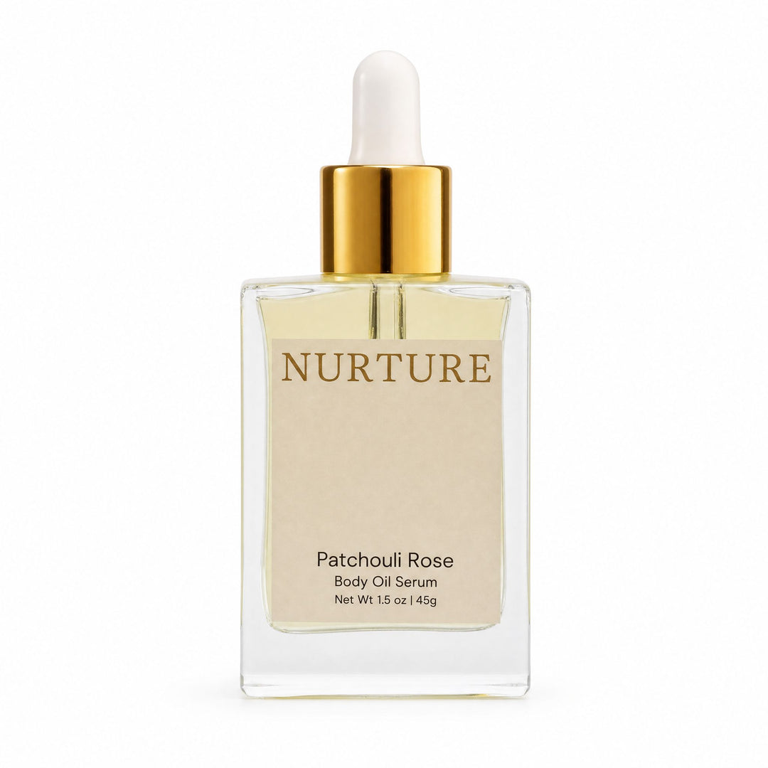 Bottle of Patchouli Rose body oil on a white background.