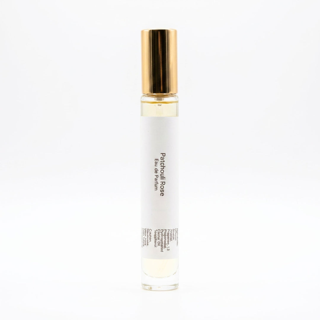 Patchouli Rose perfume atomizer on a white background
