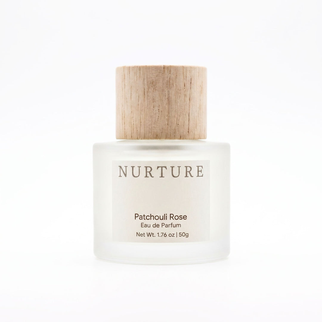 Patchouli Rose perfume atomizer on a white background