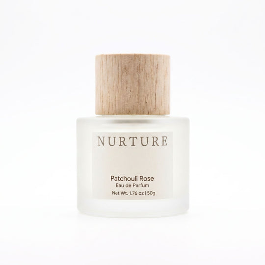 Patchouli Rose perfume atomizer on a white background