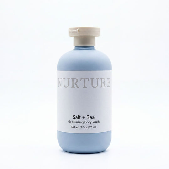 Bottle of Salt + Sea Body Wash on a white background.