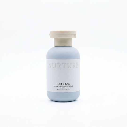 Bottle of Salt + Sea Body Wash on a white background.