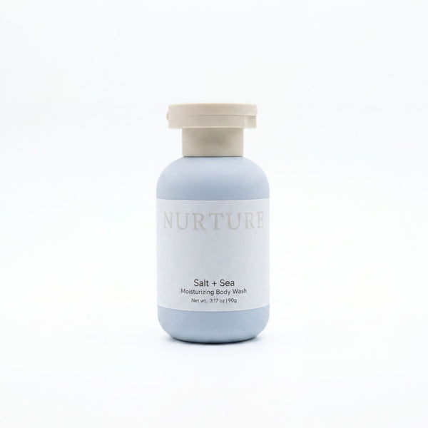 Bottle of Salt + Sea Body Wash on a white background.