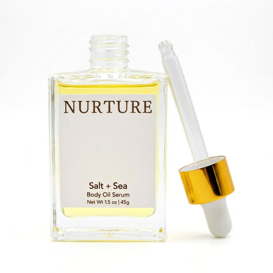 Body oil serum bottle labeled &
