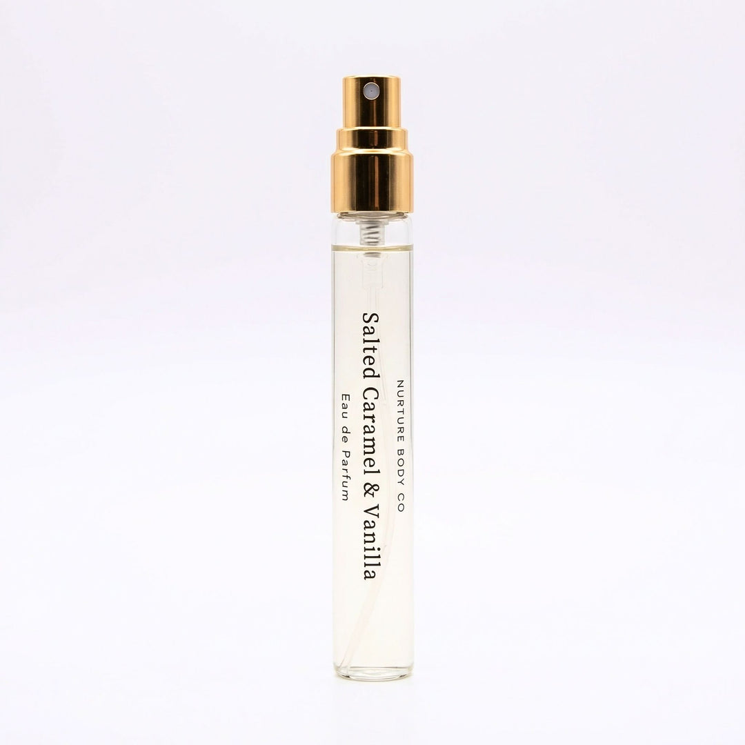Small perfume bottle labeled 'Salted Caramel & Vanilla' on a light purple background