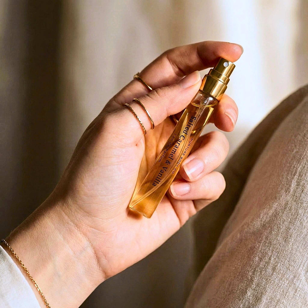 Hand holding a Salted Caramel Vanilla atomizer