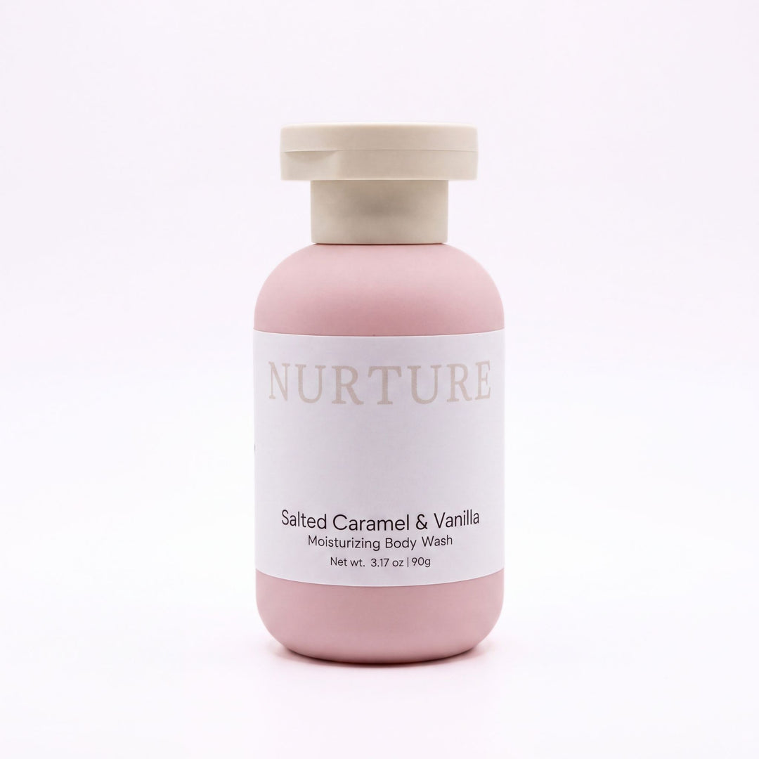 A bottle of Salted Caramel body wash on a white background.