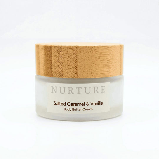 Body butter cream jar with wooden lid on a white background