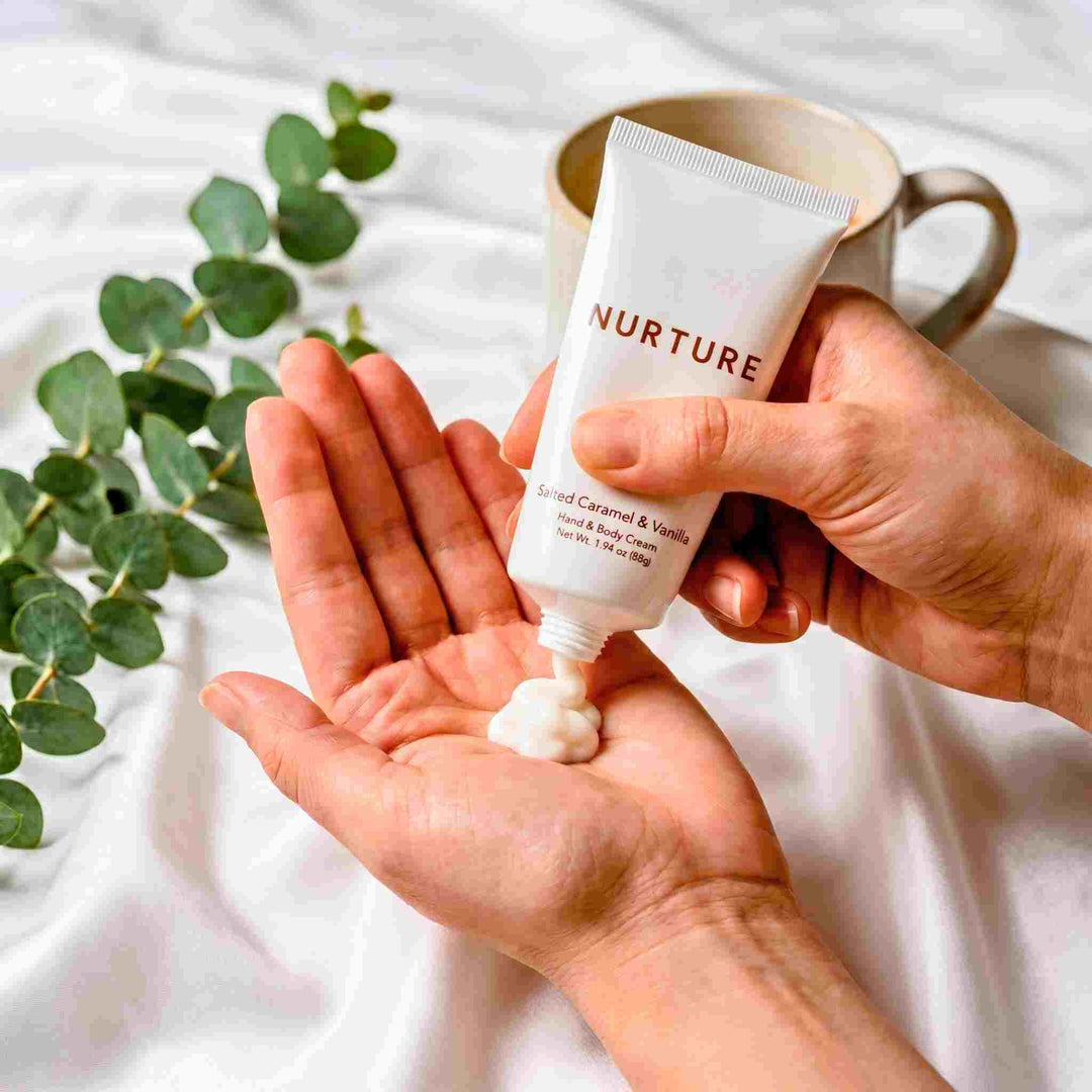 Person applying cream from a &