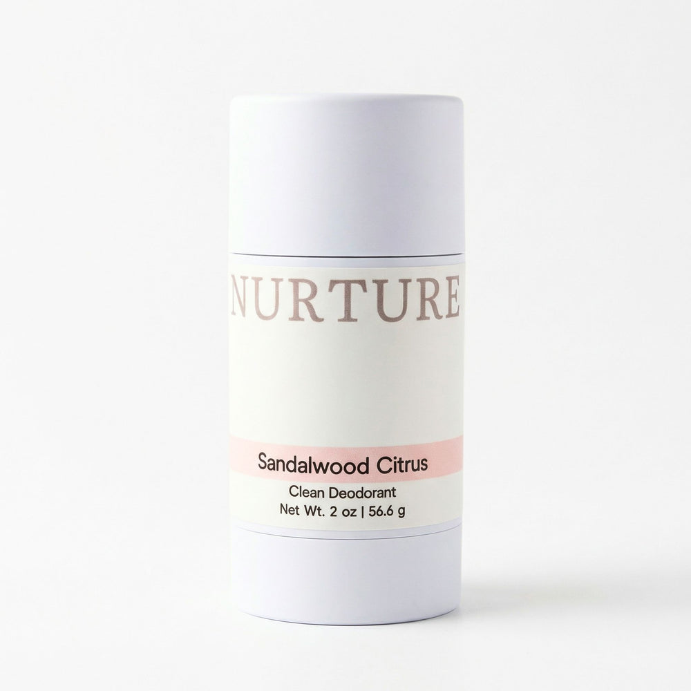 Deodorant stick labeled 'Nurture' with 'Sandalwood Citrus' on a white background