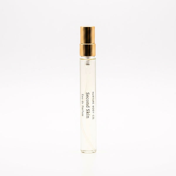 Second Skin atomizer with gold cap on a white background