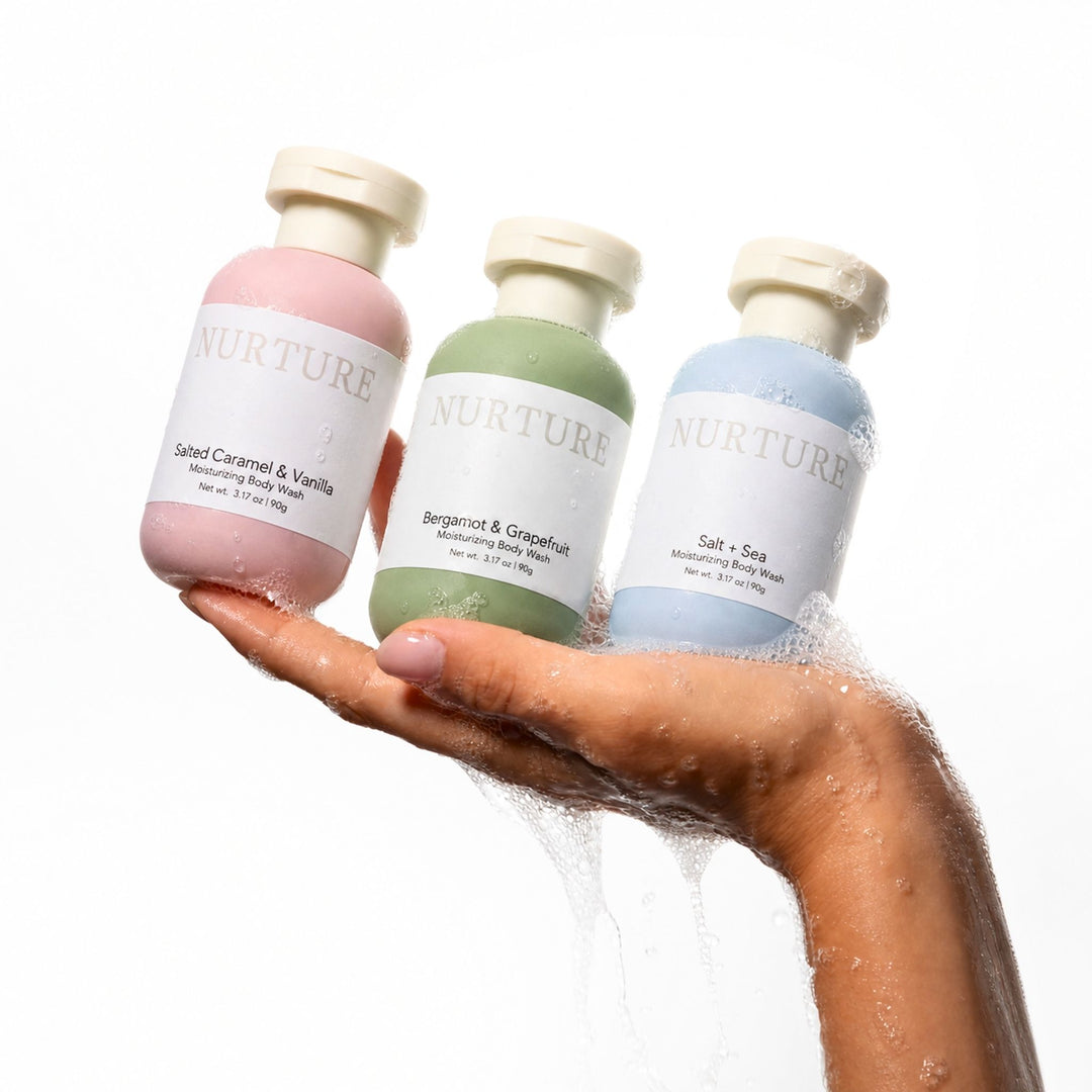 3 small bottles of body wash in a woman&
