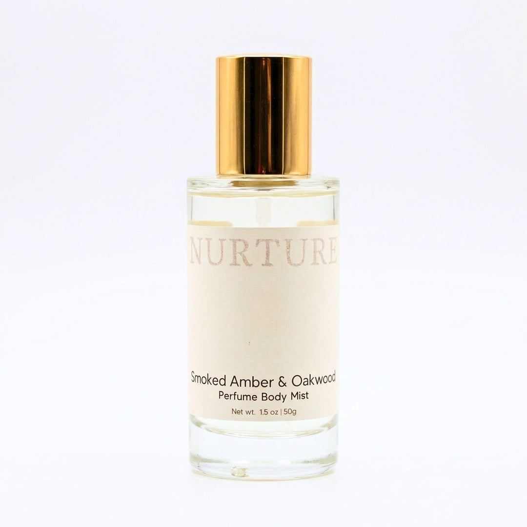 Smoked Amber & Oakwood Perfume Body Mist with gold cap on a white background