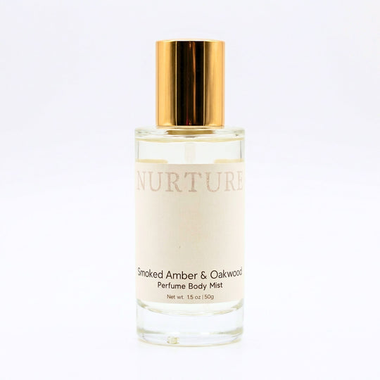 Smoked Amber &amp; Oakwood Perfume Body Mist with gold cap on a white background