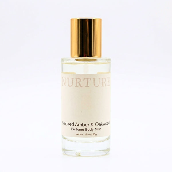 Smoked Amber & Oakwood Perfume Body Mist with gold cap on a white background
