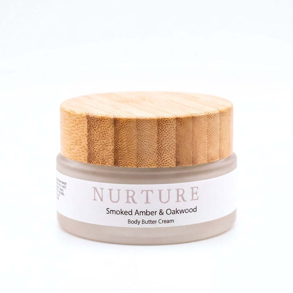 Jar of Smoked Amber Body Butter Cream on a white background.