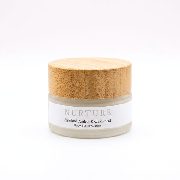 Jar of Smoked Amber Body Butter Cream on a white background.