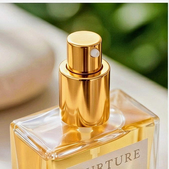 A close up of the top of the Nurture Body Oil Serum bottle.