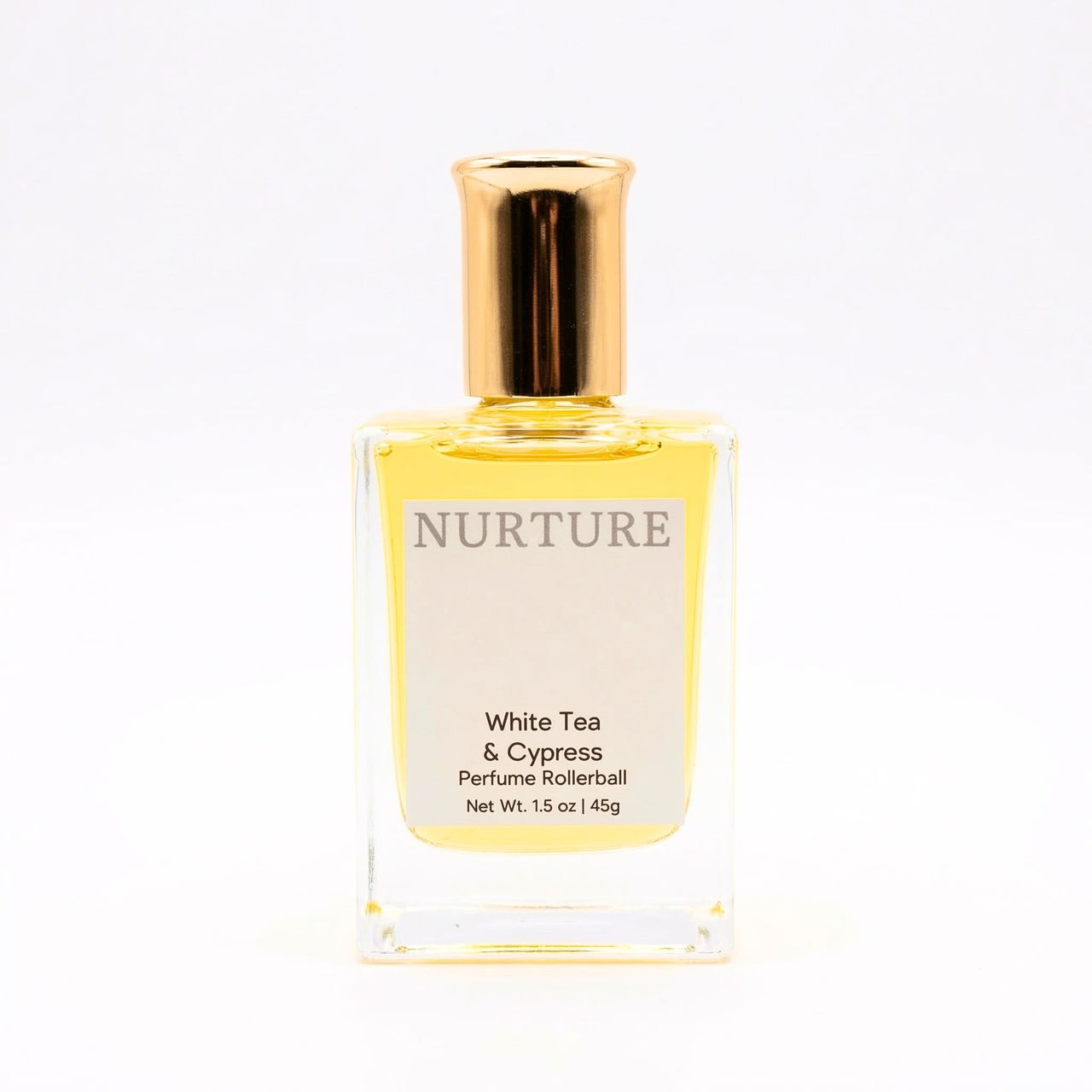 Perfume rollerball labeled 'Nurture White Tea & Cypress' on a white background